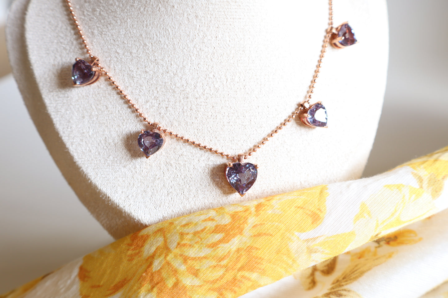 18K rose gold necklace with five alexandrite gemstones in bezel settings. A rare fine jewelry piece in Singapore, elegantly packaged for gifts or corporate milestones.