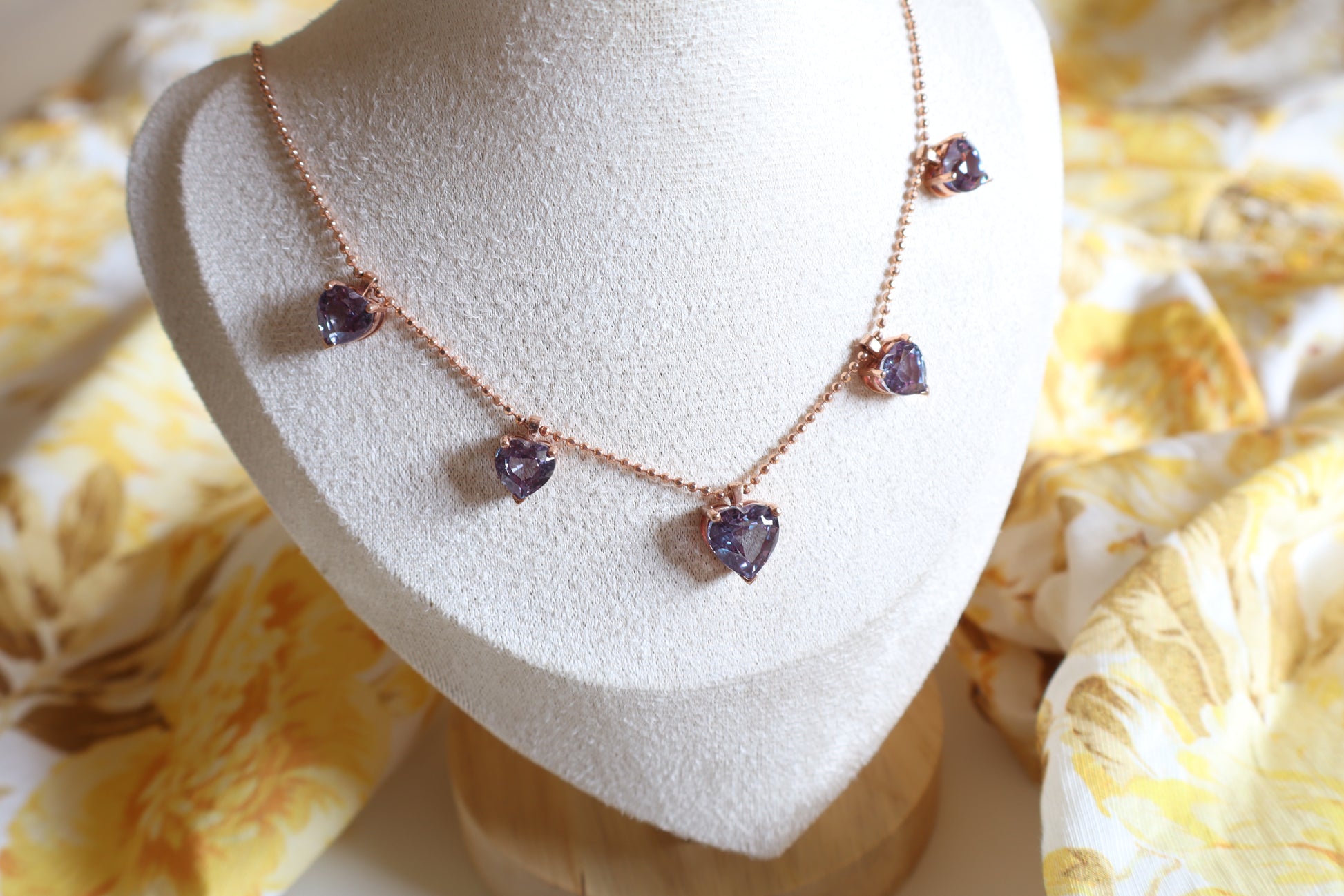 18K rose gold necklace with five alexandrite gemstones in bezel settings. A rare fine jewelry piece in Singapore, elegantly packaged for gifts or corporate milestones.