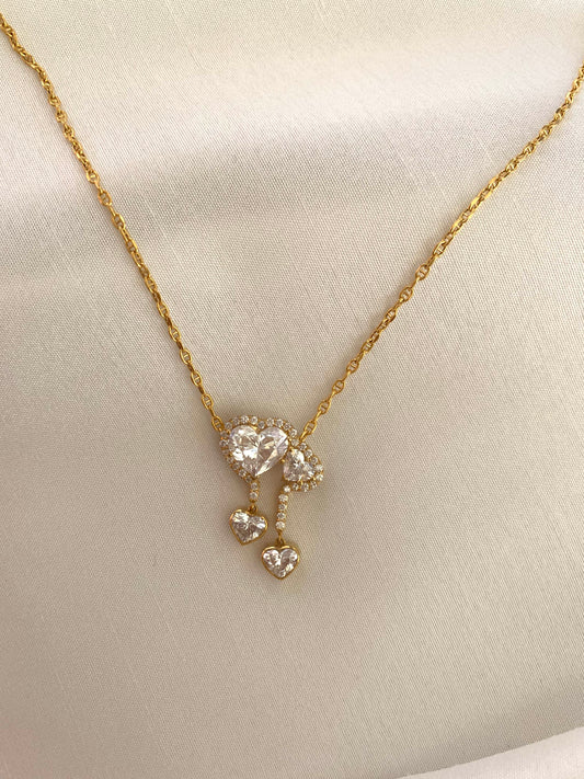 18K gold necklace featuring a 3ct diamond and GIA-certified heart diamonds. Sustainable corporate gift jewelry with abaca packaging. Custom gold-plated necklace, bespoke design in Singapore.