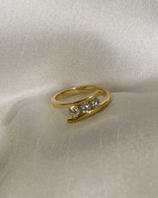 Load image into Gallery viewer, Three stone diamond ring set in 2 diagonal designs in yellow gold.
