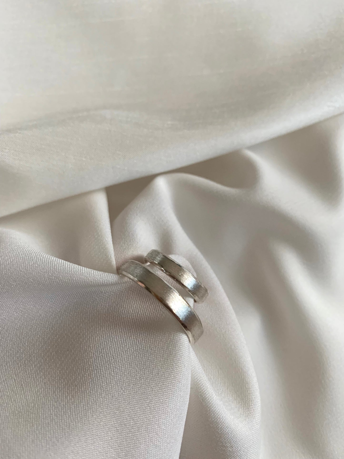 White gold, slender, simple, classy, classic wedding rings.