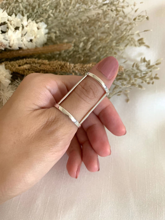 A white gold finger brace which supports the finger/s.