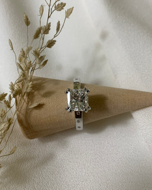 2.01 carat GIA certified princess cut diamond ring in double prong setting and 18K white gold.