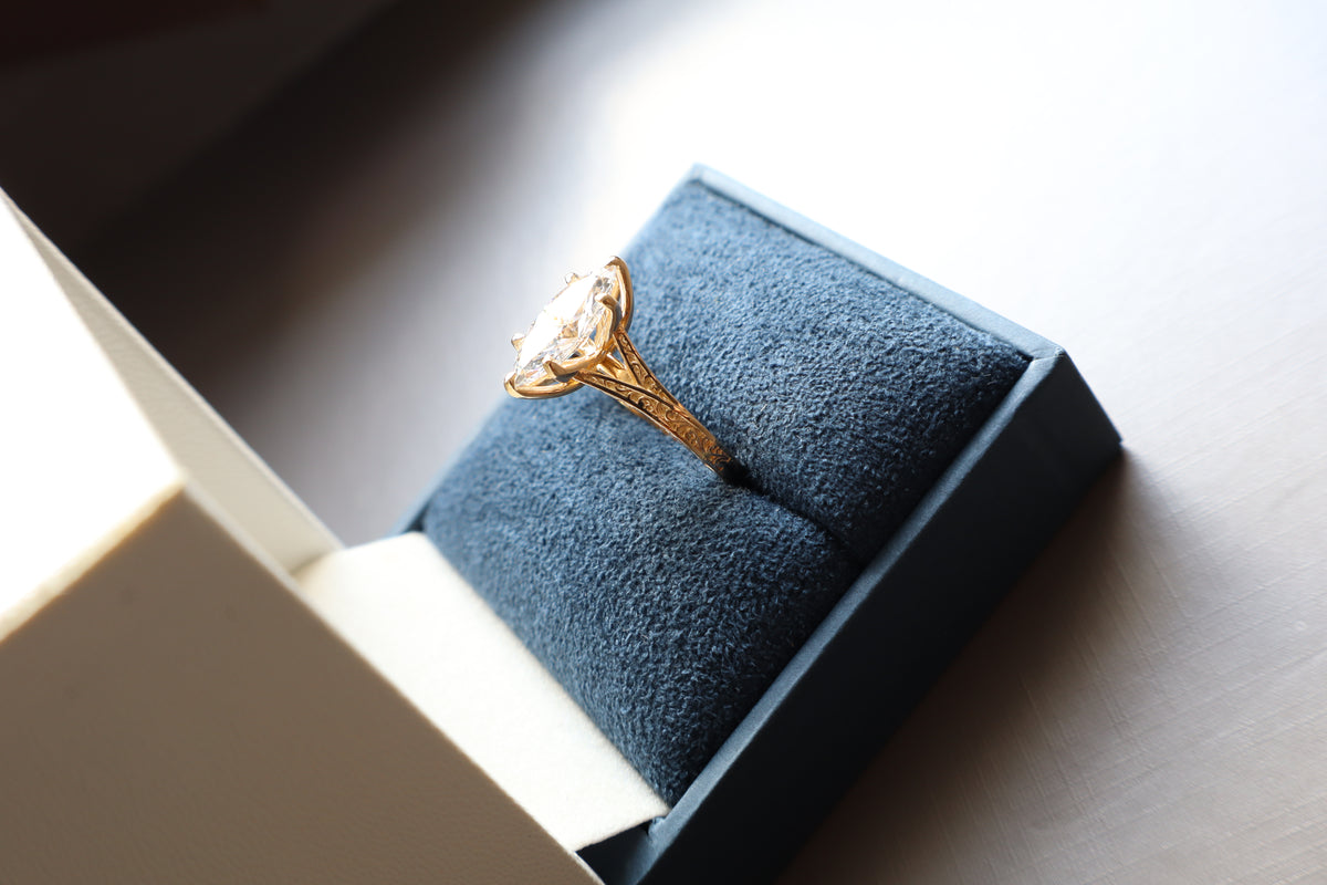 14K gold custom vintage engagement ring with diamond and personalized Alibata engraving, featuring intricate vintage-inspired details.