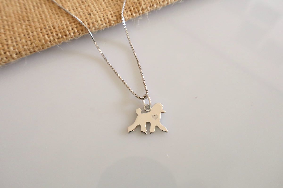 14K white gold giant poodle pendant, a minimalist custom dog jewelry piece crafted as a personalized pet keepsake.