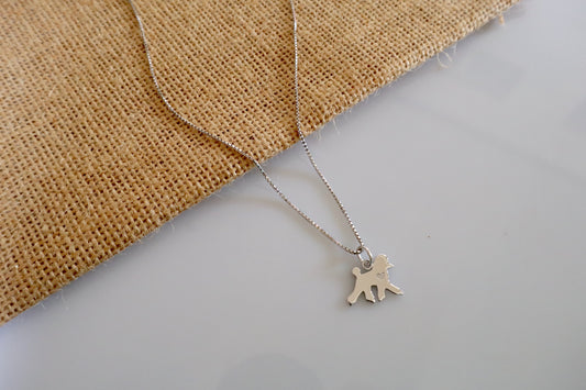 14K white gold giant poodle pendant, a minimalist custom dog jewelry piece crafted as a personalized pet keepsake.