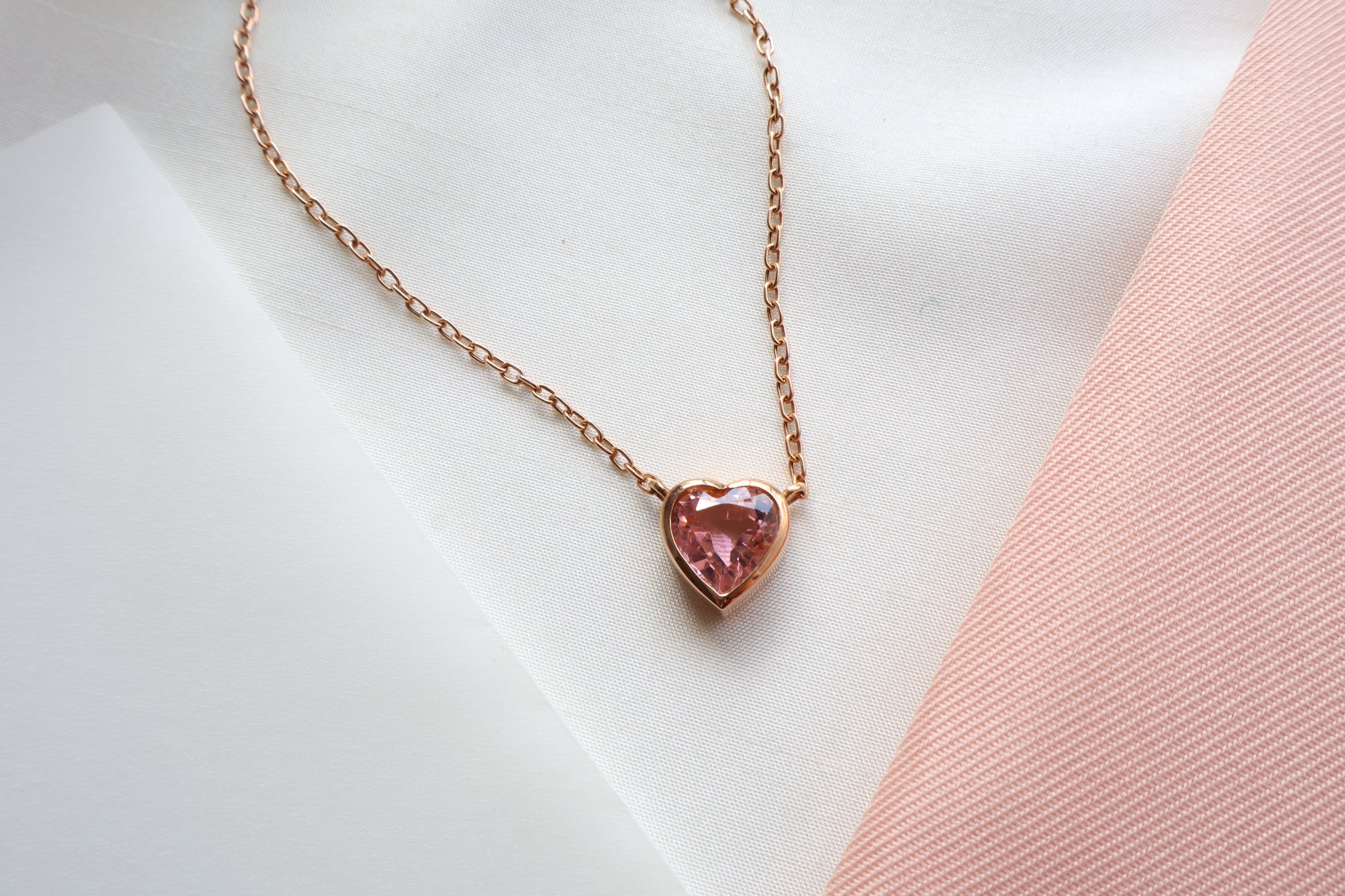 18K rose gold heart necklace with 2.64 carat pink sapphire on an 18-inch chain — Singapore business milestone jewelry, luxury corporate gift, commemorative service award piece with elegant presentation