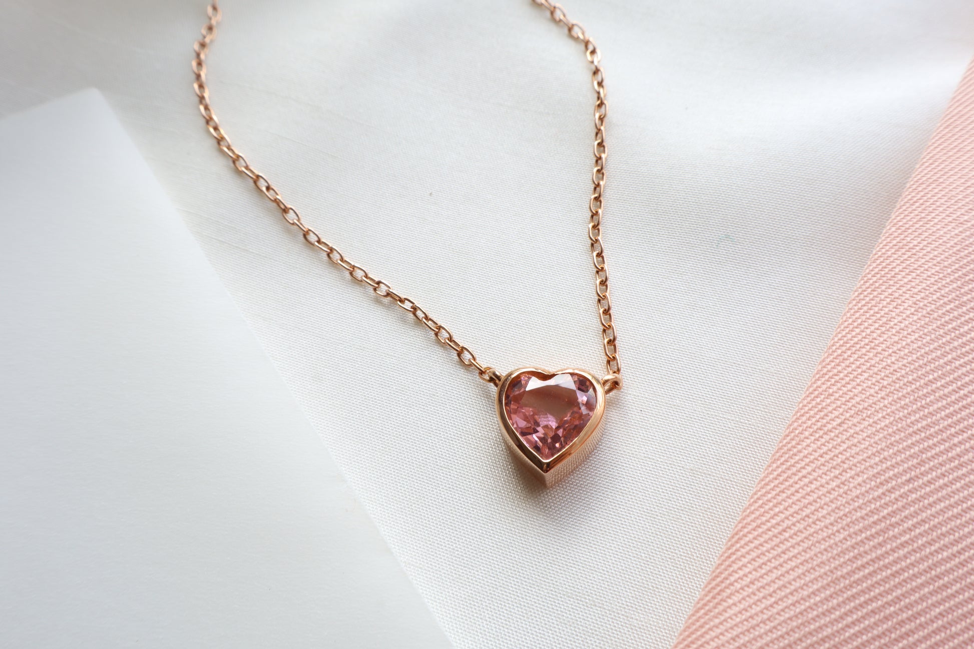 18K rose gold heart necklace with 2.64 carat pink sapphire on an 18-inch chain — Singapore business milestone jewelry, luxury corporate gift, commemorative service award piece with elegant presentation
