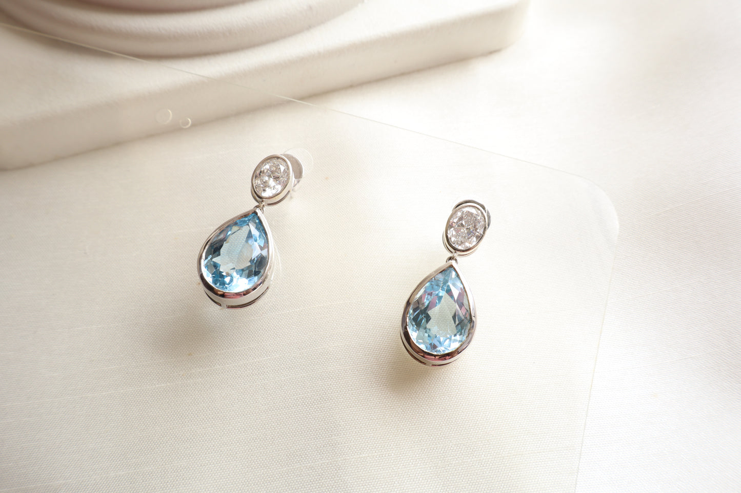 Luxury aquamarine and natural diamond drop earrings in 18K white gold, fine jewelry piece suitable for employee recognition gift jewelry for Singapore firms.