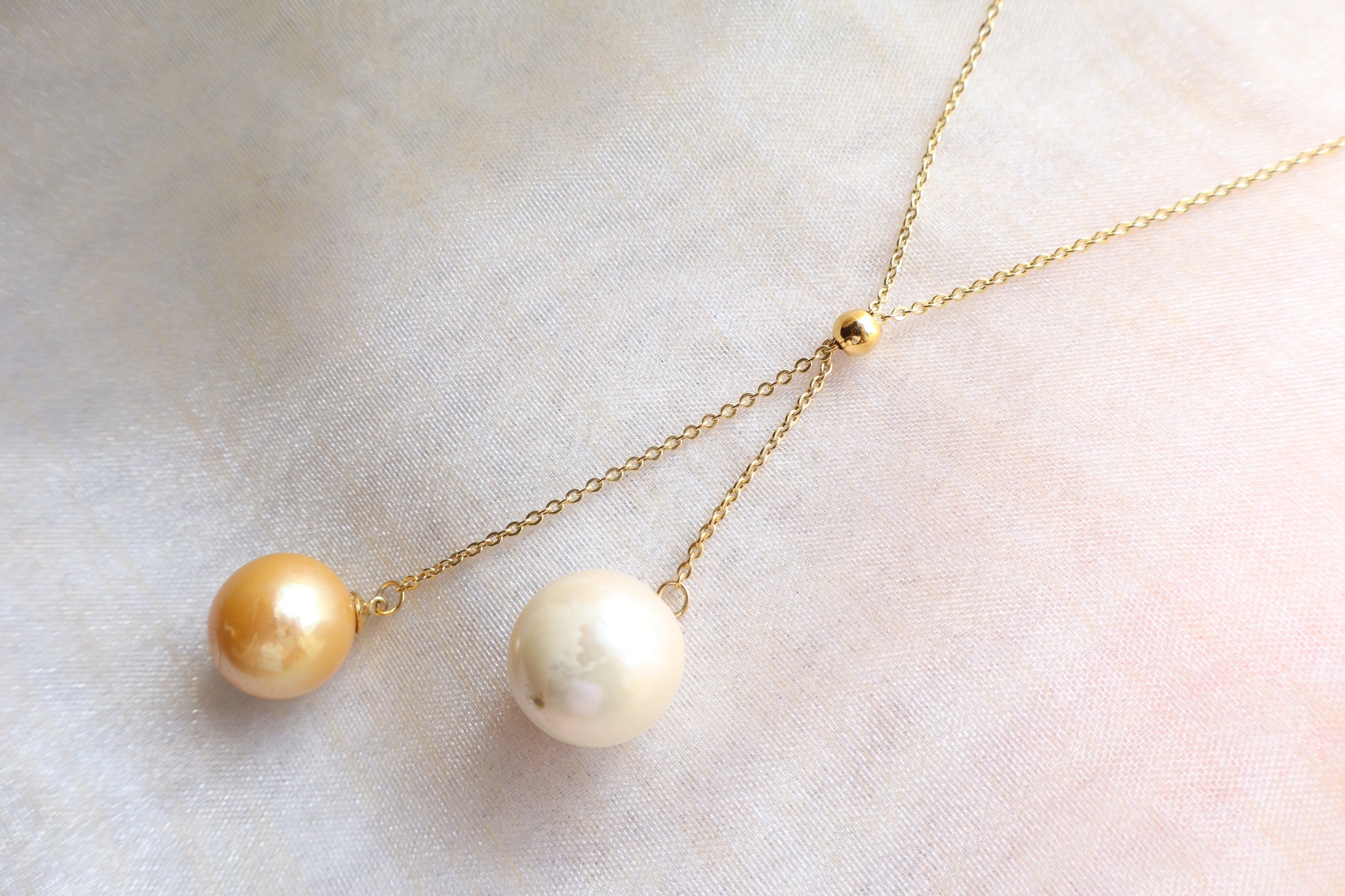 Adjustable pearl drop necklace on solid 18K gold chain with sliding bead mechanism — custom fine jewelry necklace upgrade in Singapore.