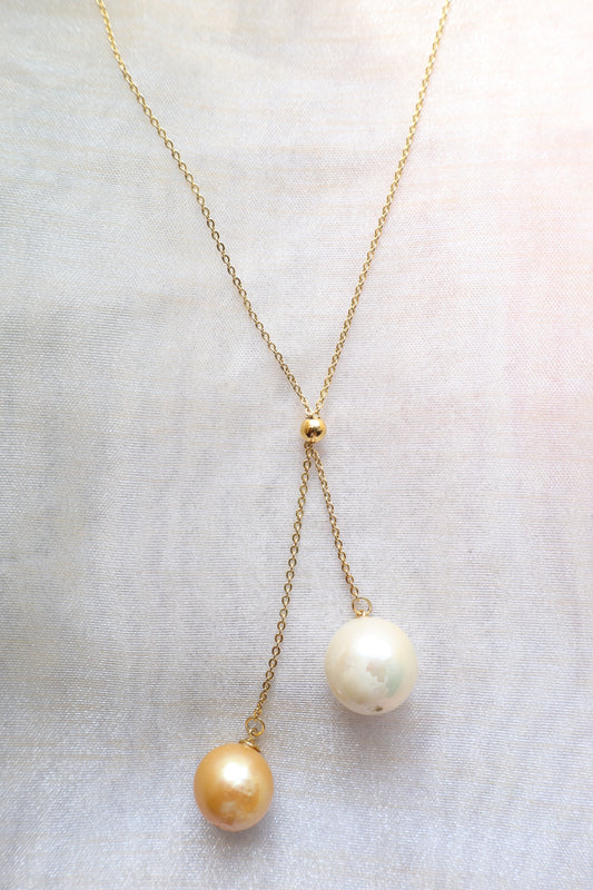 Adjustable pearl drop necklace on solid 18K gold chain with sliding bead mechanism — custom fine jewelry necklace upgrade in Singapore.