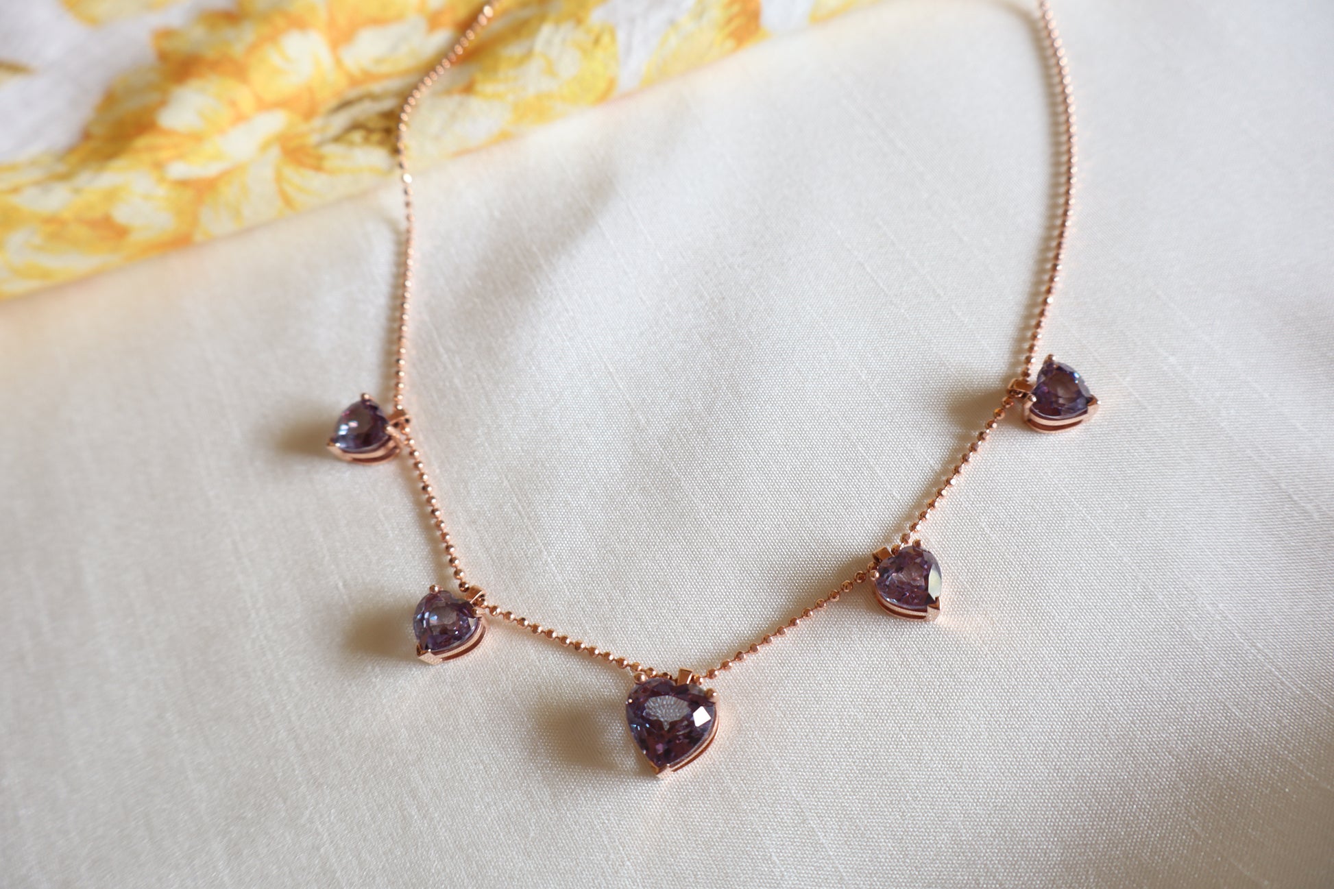 18K rose gold necklace with five alexandrite gemstones in bezel settings. A rare fine jewelry piece in Singapore, elegantly packaged for gifts or corporate milestones.
