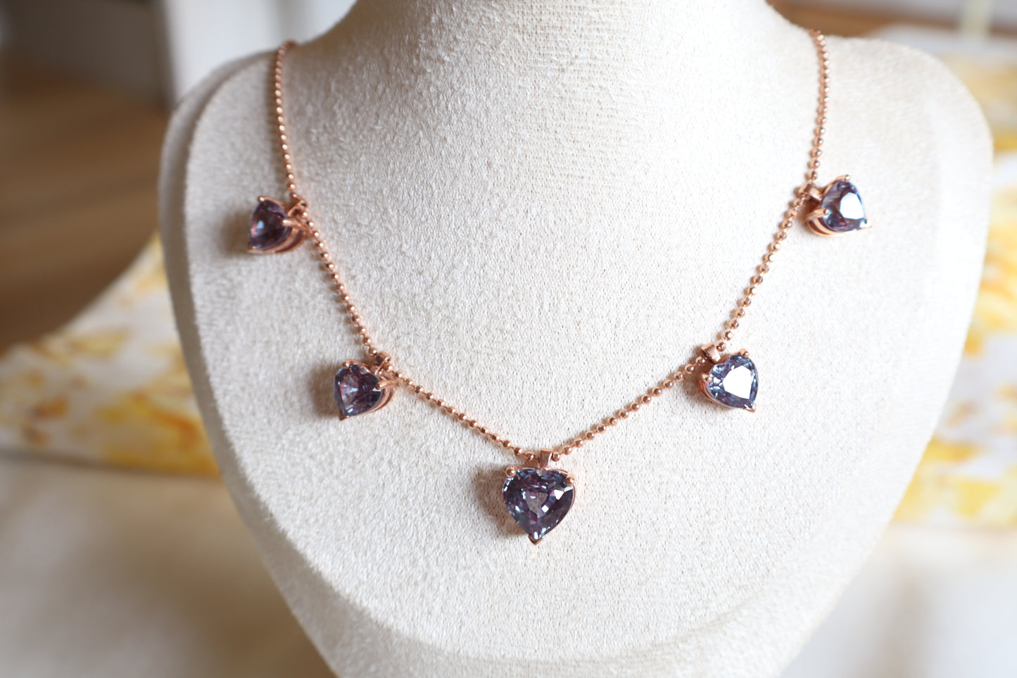 18K rose gold necklace with five alexandrite gemstones in bezel settings. A rare fine jewelry piece in Singapore, elegantly packaged for gifts or corporate milestones.
