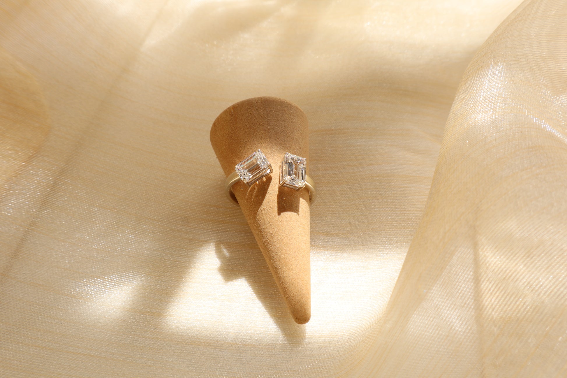 14 karat white gold diamond cluster ring with emerald-cut lab-grown diamonds, in Emildific abaca packaging, Singapore corporate.