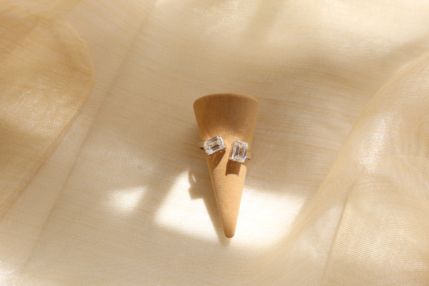 14 karat white gold diamond cluster ring with emerald-cut lab-grown diamonds, in Emildific abaca packaging, Singapore corporate.