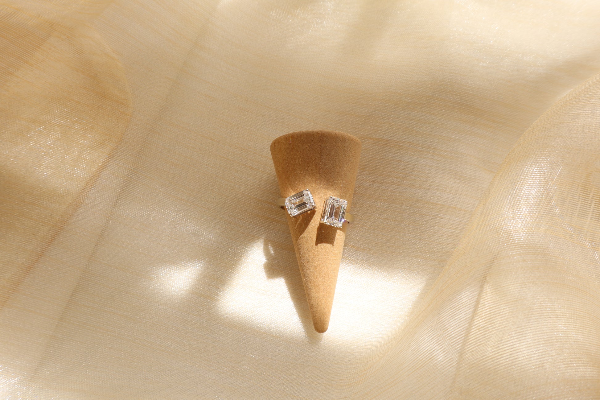 14 karat white gold diamond cluster ring with emerald-cut lab-grown diamonds, in Emildific abaca packaging, Singapore corporate.