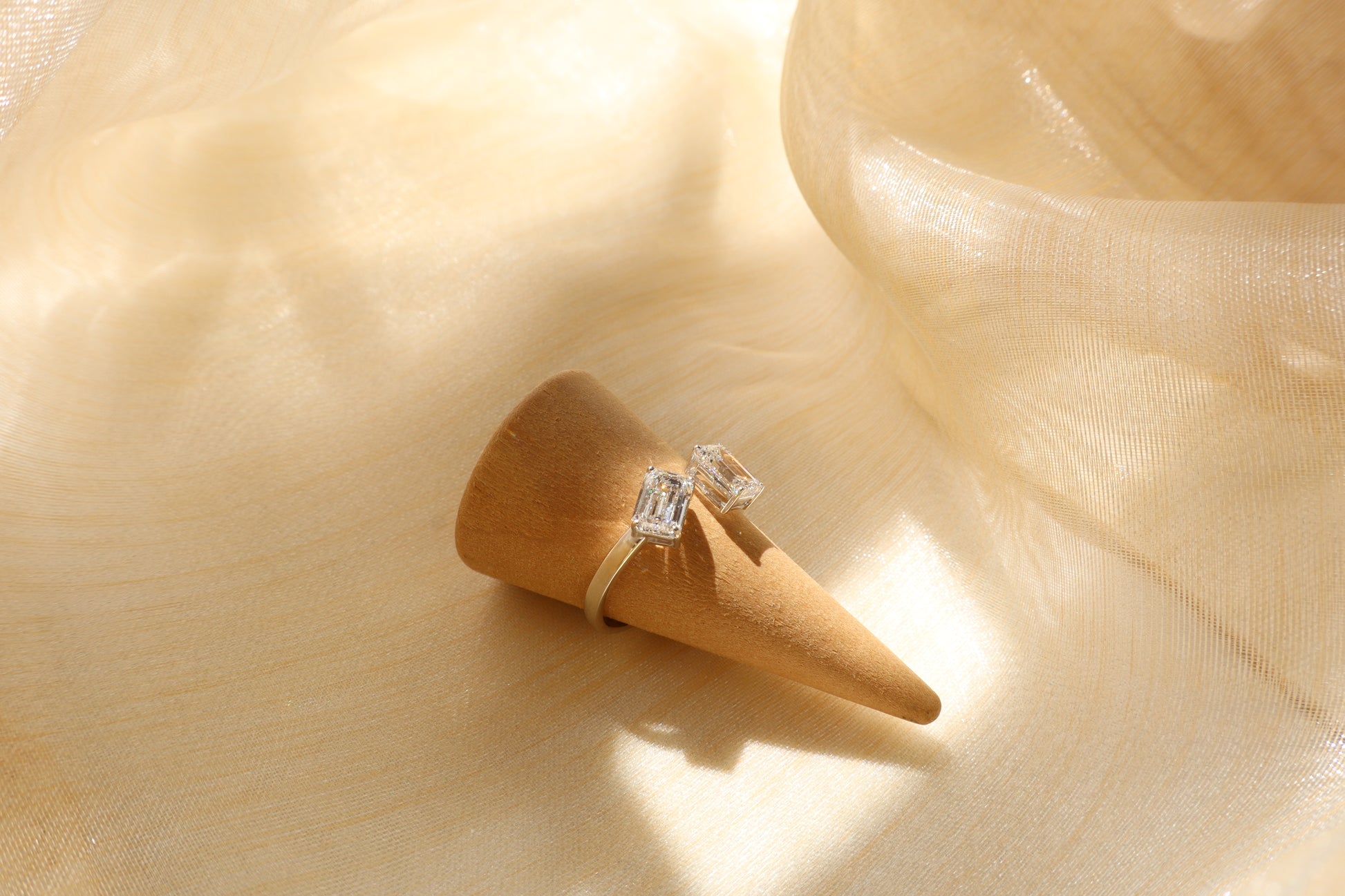 14 karat white gold diamond cluster ring with emerald-cut lab-grown diamonds, in Emildific abaca packaging, Singapore corporate.