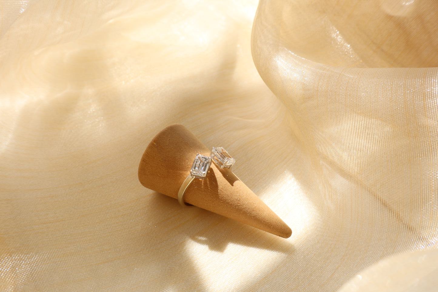 14 karat white gold diamond cluster ring with emerald-cut lab-grown diamonds, in Emildific abaca packaging, Singapore corporate.