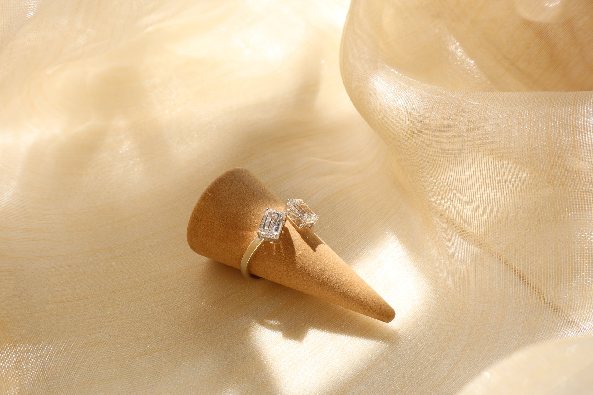 14 karat white gold diamond cluster ring with emerald-cut lab-grown diamonds, in Emildific abaca packaging, Singapore corporate.