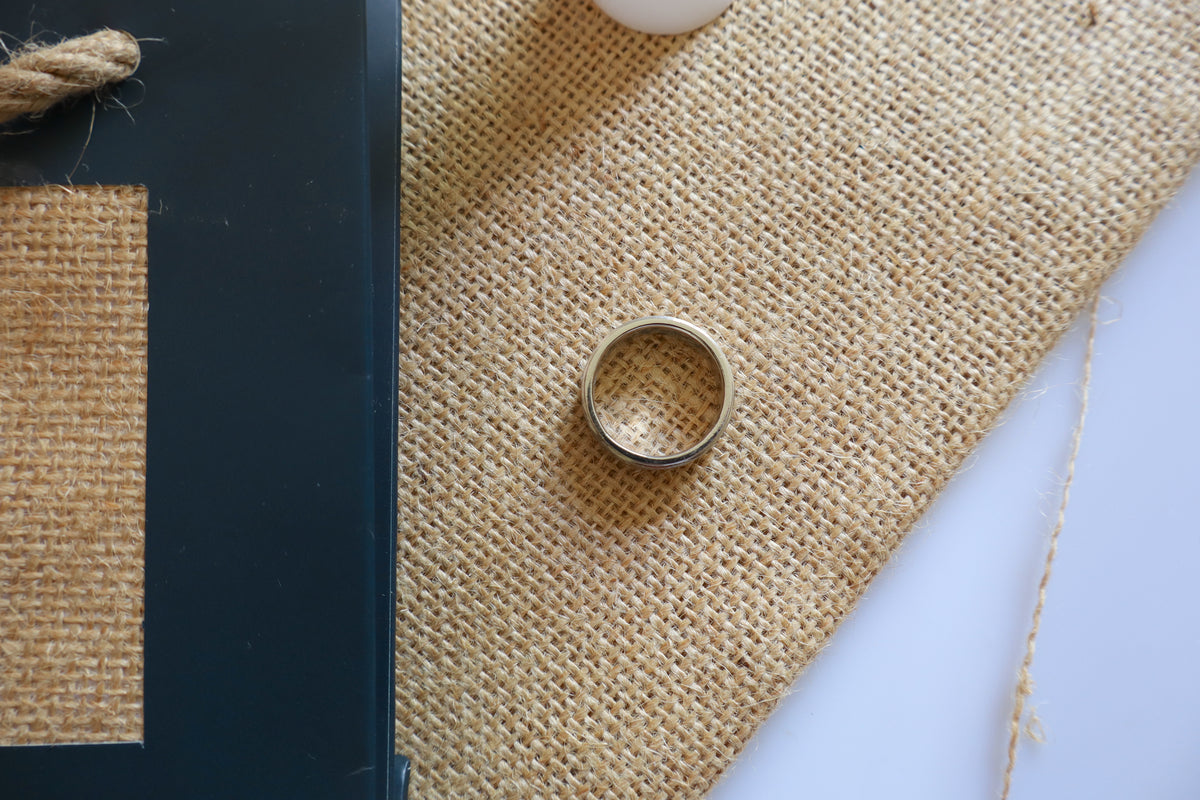 Handcrafted Platinum 950 ring featuring three natural diamonds in a modern brushed design. Ideal example of custom jewelry craftsmanship for corporate awards, service pins, and premium gifting.