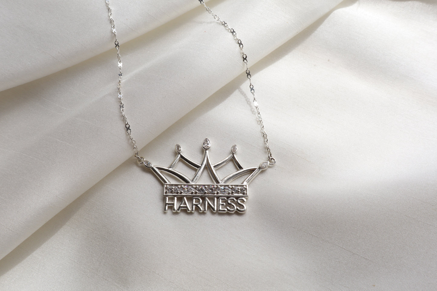 Corporate jewelry supplier Singapore — custom crown necklace in silver with signity stones, personalized statement pendant