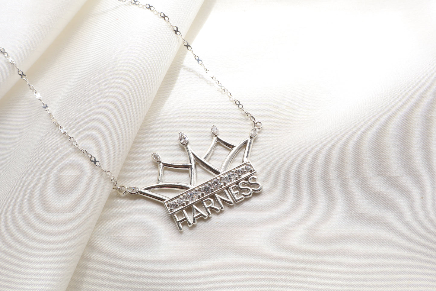 Corporate jewelry supplier Singapore — custom crown necklace in silver with signity stones, personalized statement pendant