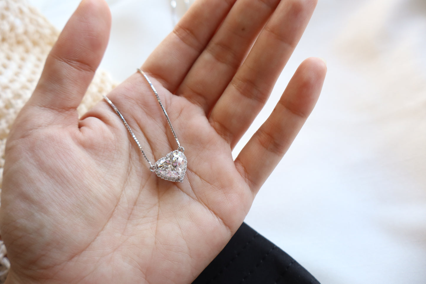 Heart-shaped 3 carat lab diamond halo pendant necklace on a fine chain — Eco-luxury abaca packaging with bespoke corporate recognition jewelry, customized design.