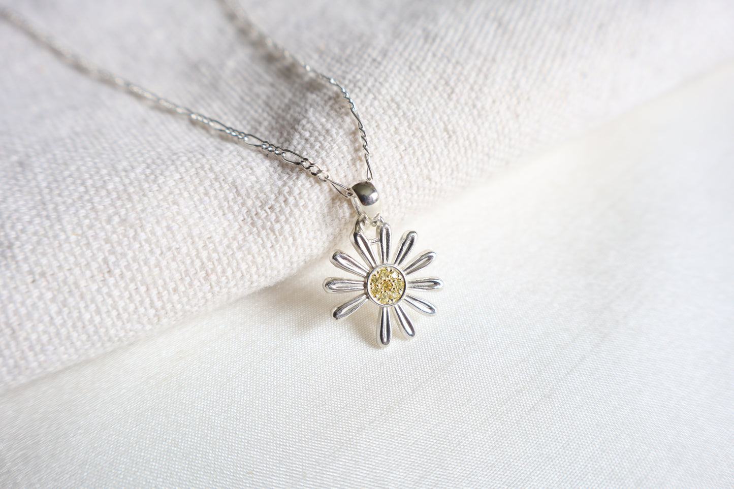 925 Silver K-Pop idol daisy pendant with Yellow Sapphires, showcased in Singapore custom gift packaging for corporate events