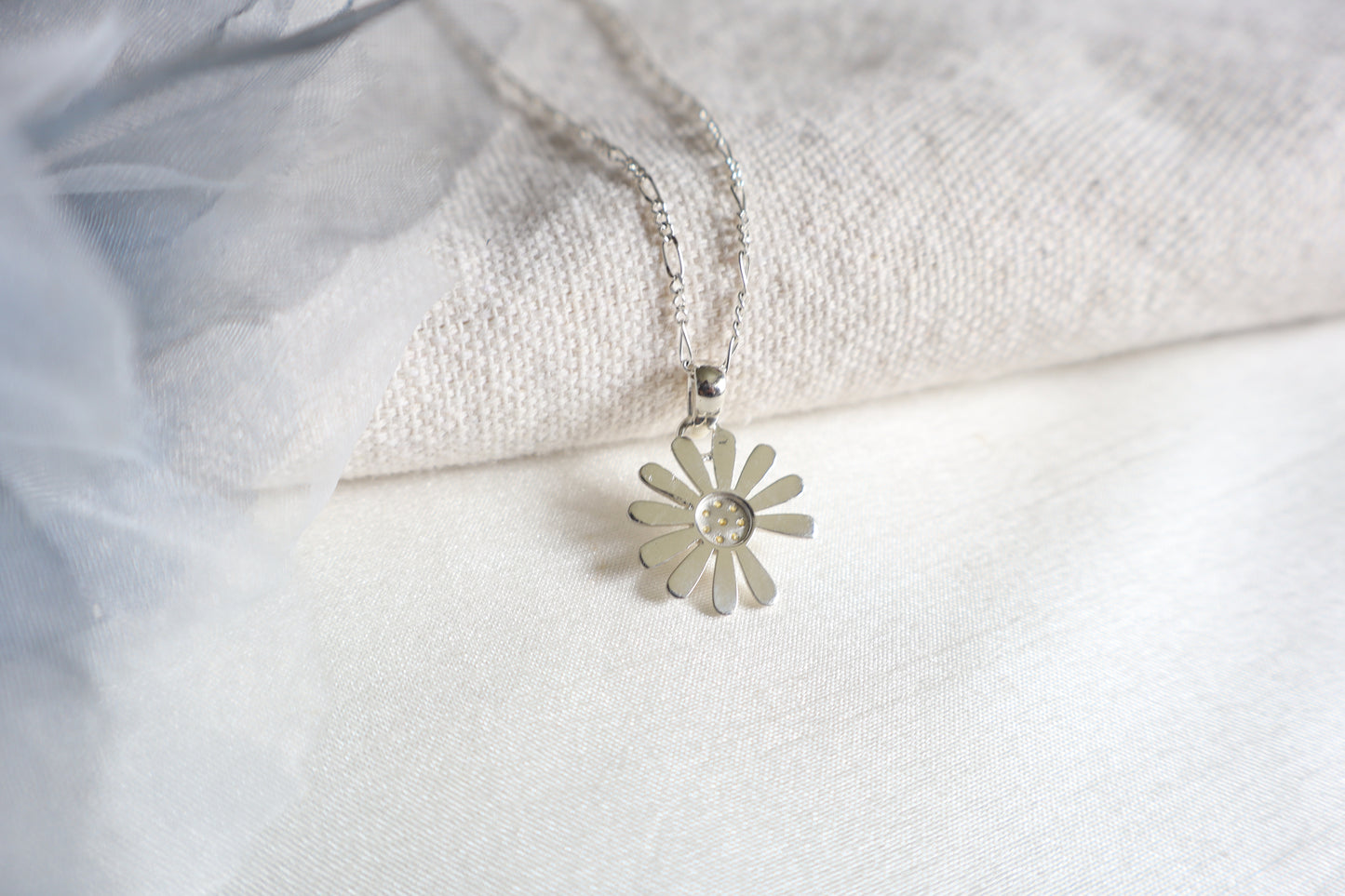 925 Silver K-Pop idol daisy pendant with Yellow Sapphires, showcased in Singapore custom gift packaging for corporate events