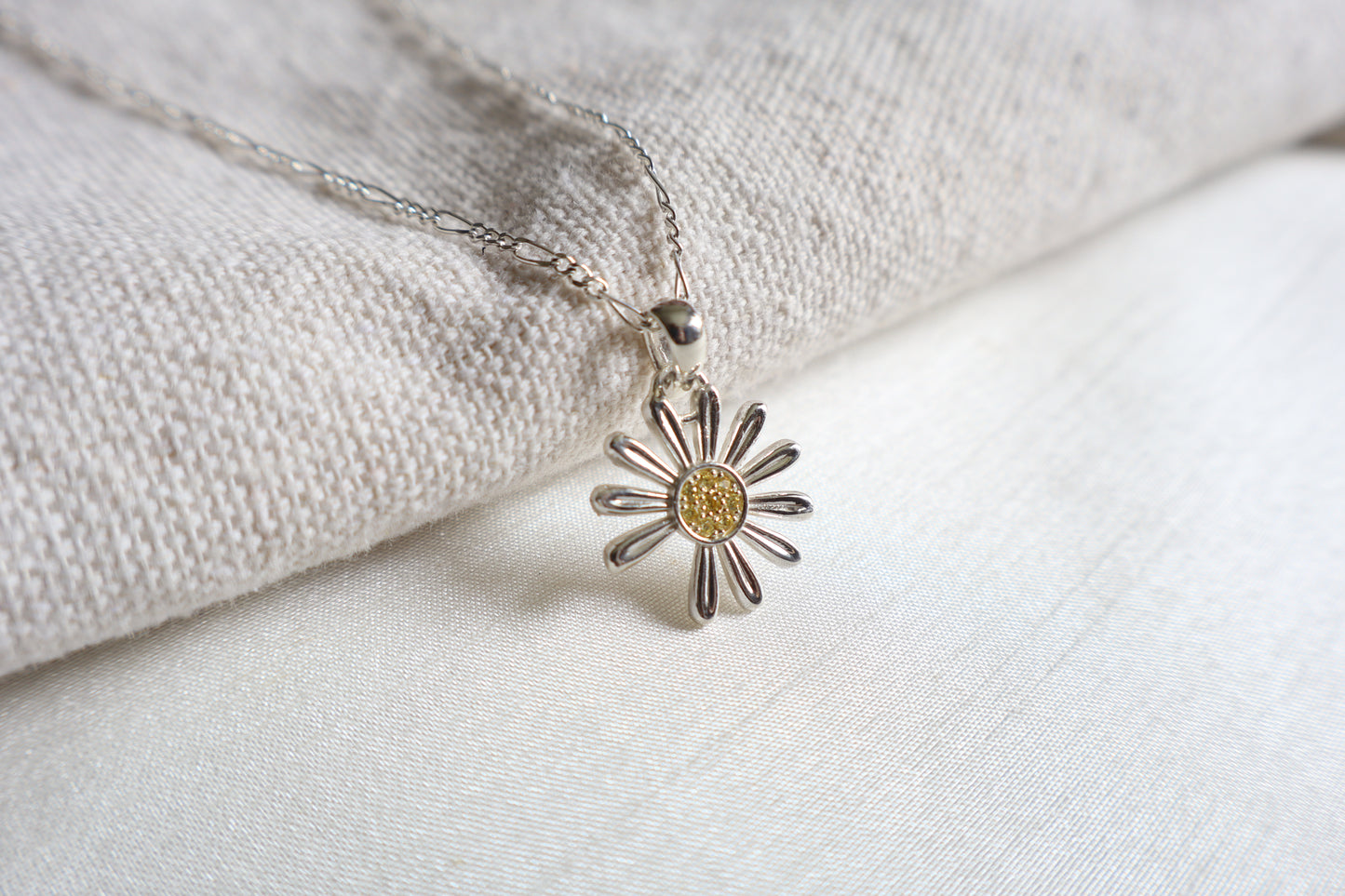 925 Silver K-Pop idol daisy pendant with Yellow Sapphires, showcased in Singapore custom gift packaging for corporate events