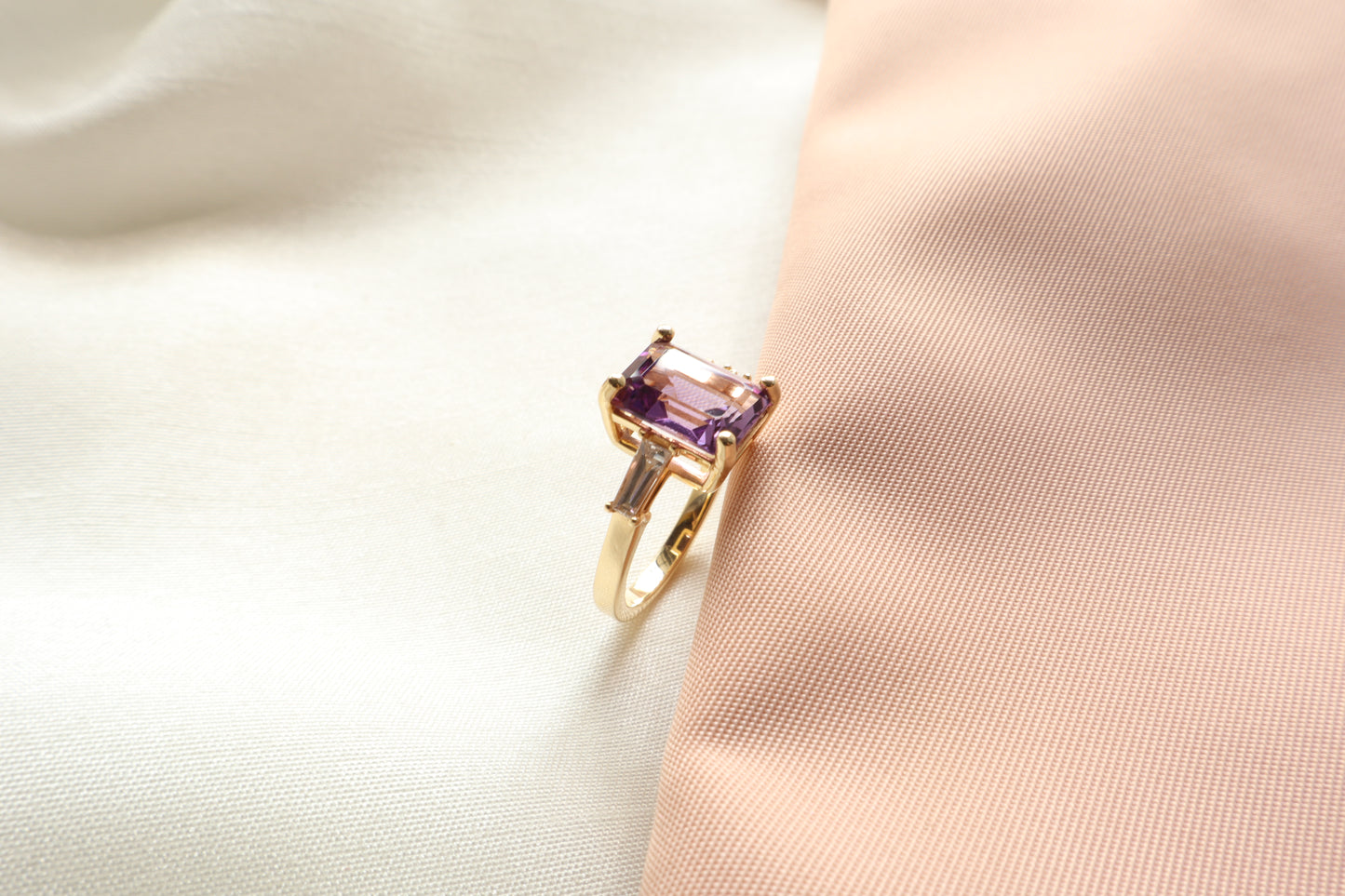 Custom 14K gold amethyst ring with tapered baguette accents in a vintage style. Packed in sustainable, eco-conscious packaging. Ideal for Singapore corporate gifting and premium presents.
