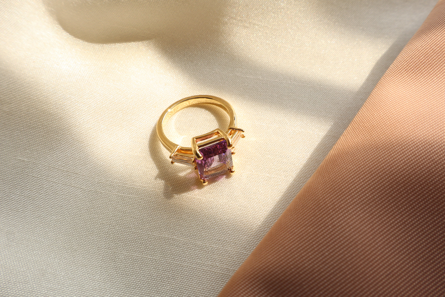Custom 14K gold amethyst ring with tapered baguette accents in a vintage style. Packed in sustainable, eco-conscious packaging. Ideal for Singapore corporate gifting and premium presents.