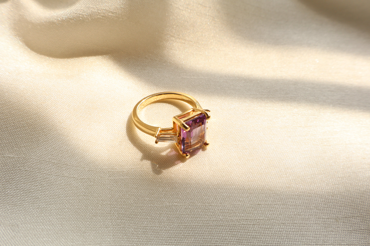 Custom 14K gold amethyst ring with tapered baguette accents in a vintage style. Packed in sustainable, eco-conscious packaging. Ideal for Singapore corporate gifting and premium presents.