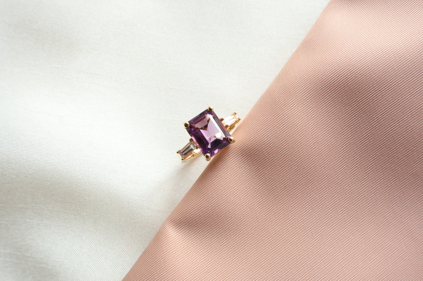 Custom 14K gold amethyst ring with tapered baguette accents in a vintage style. Packed in sustainable, eco-conscious packaging. Ideal for Singapore corporate gifting and premium presents.