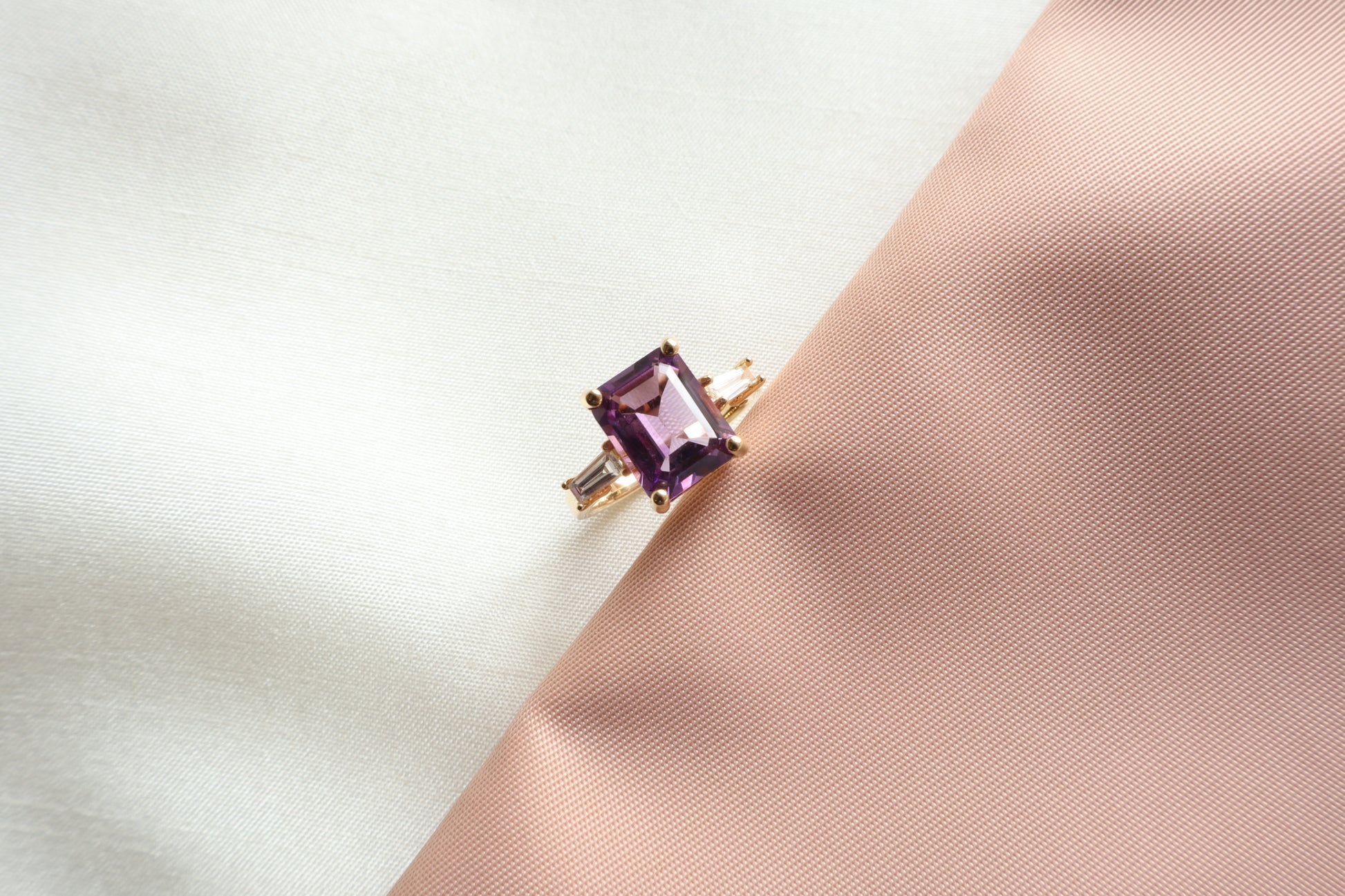 Custom 14K gold amethyst ring with tapered baguette accents in a vintage style. Packed in sustainable, eco-conscious packaging. Ideal for Singapore corporate gifting and premium presents.