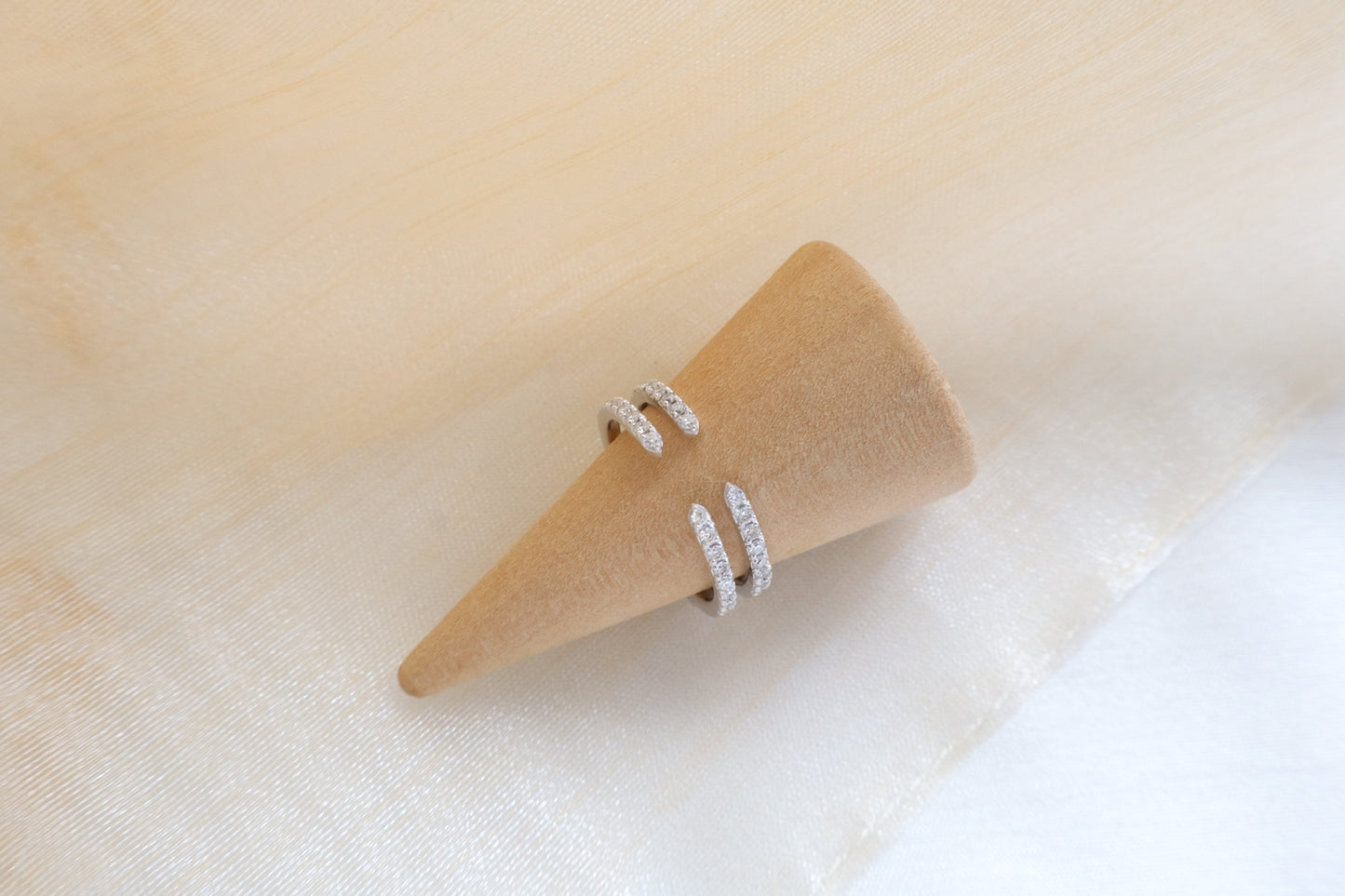Custom gold bridal ring set with a moissanite engagement ring, diamond wedding band, and engraved groom’s ring, designed as a cohesive family heirloom. Eco-friendly abaca packaging. Singapore corporate jewelry.