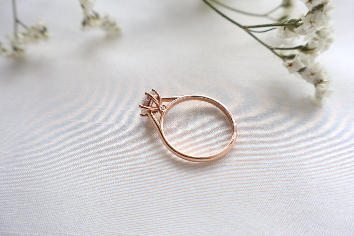 14K rose gold lab diamond engagement ring with concealed accent stone and clean minimalist design, Singapore custom fine jewelry with ethical sourcing