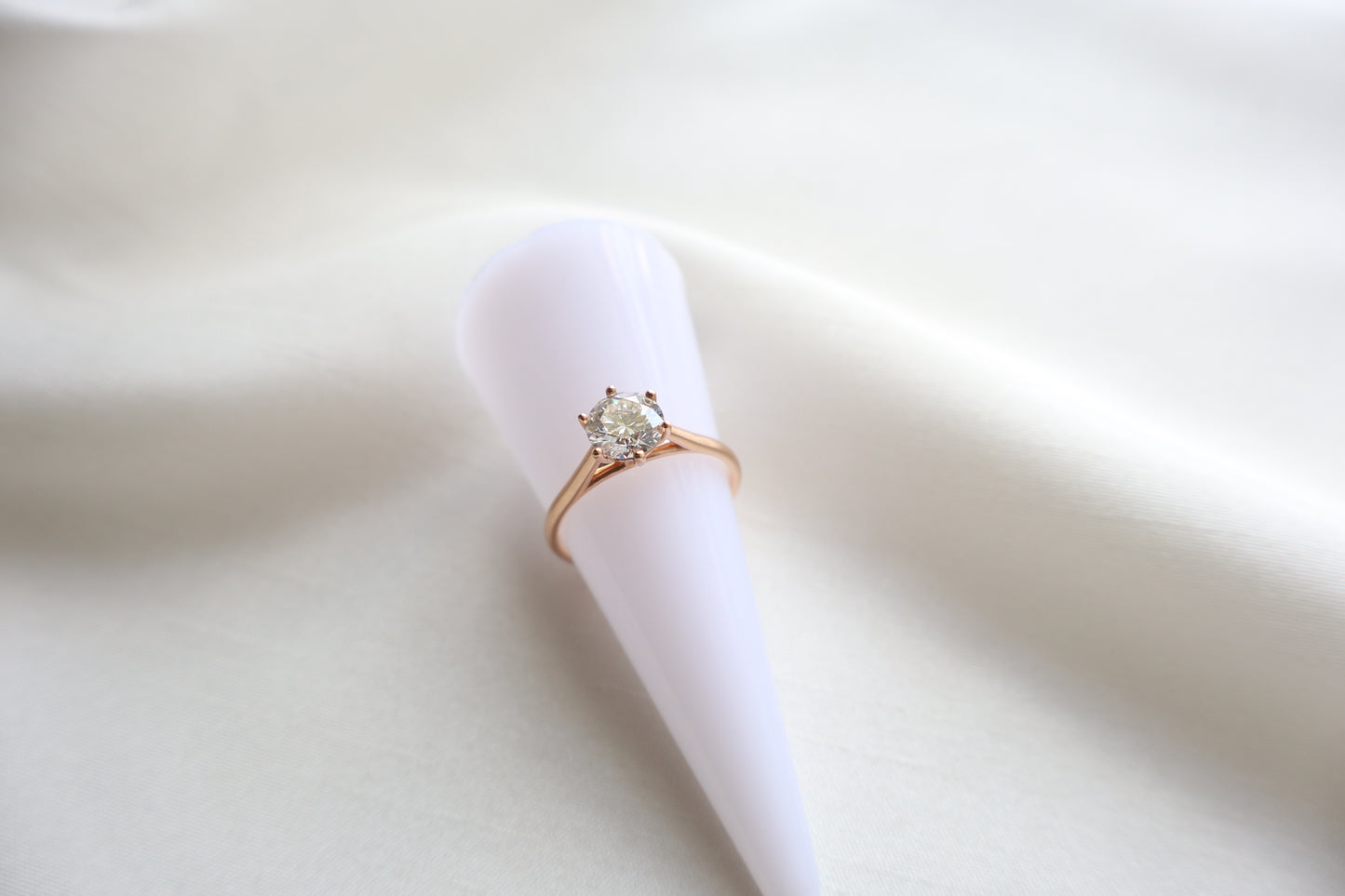 14K rose gold lab diamond engagement ring with concealed accent stone and clean minimalist design, Singapore custom fine jewelry with ethical sourcing
