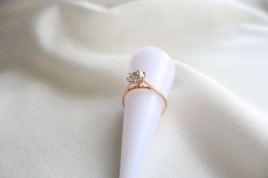 14K rose gold lab diamond engagement ring with concealed accent stone and clean minimalist design, Singapore custom fine jewelry with ethical sourcing