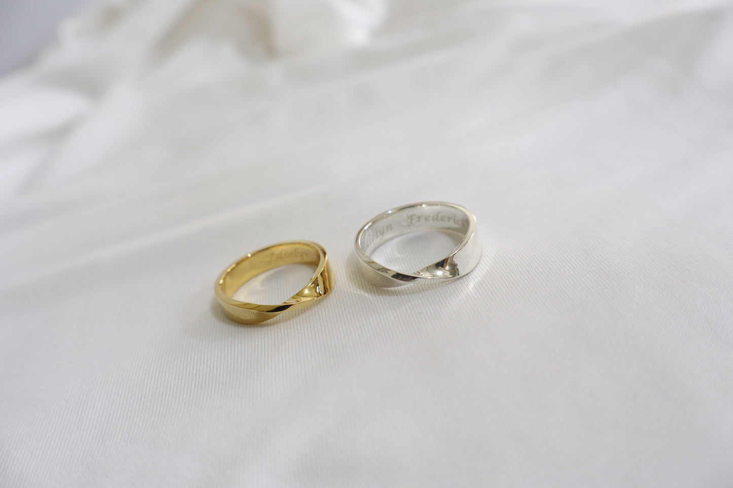 Two-tone silver and gold curved couple rings, minimalist his and hers commitment bands — Corporate service anniversary jewelry — gold pin with logo engraving, Singapore supplier.