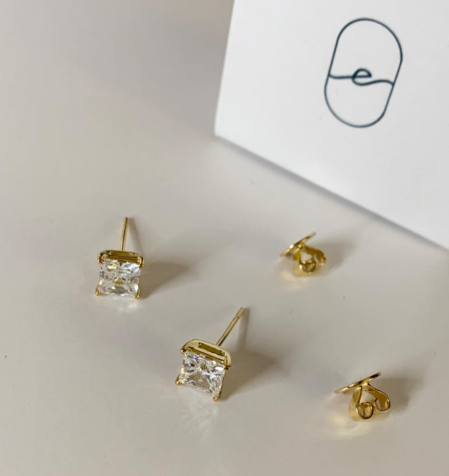 2carats each ear, princess cut diamond earrings. Set in yellow gold.  