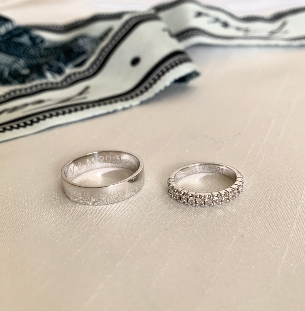 Matching wedding bands made of solid 18k white gold and shinny stones.