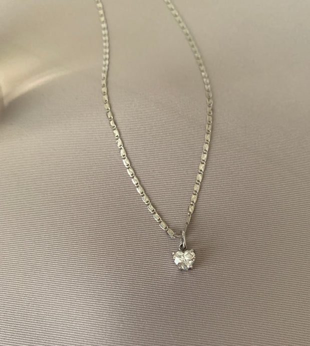 Heart diamond necklace in white gold.