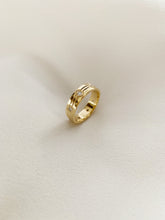 Load image into Gallery viewer, Yellow gold ring with 2 lines in it and small round diamonds around the ring.
