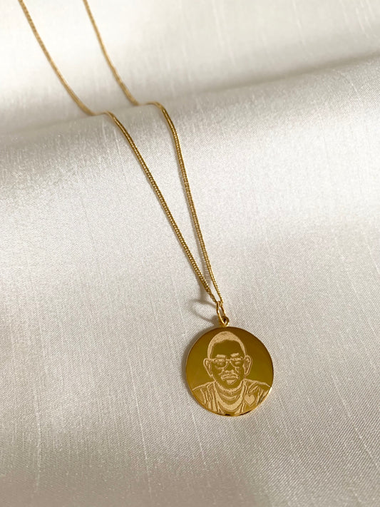 Round yellow gold pendant with an engraved photo of your choice. 