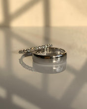 Load image into Gallery viewer, For the bride-moissanites half eternity ring set in white gold. For the groom-a simple classic white gold wedding band.
