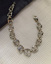 Load image into Gallery viewer, Closely linked silver beer tabs made as an attractive and unique bracelet.
